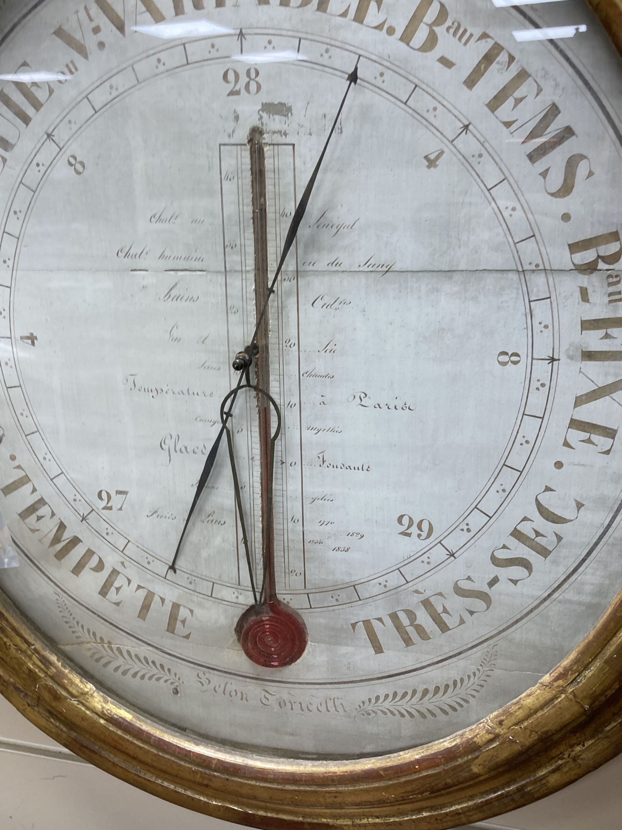 A 19th century French carved giltwood barometer / thermometer, width 68cm, height 92cm